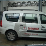 Fahrzeugbeschriftung - Dacia Logan - Yoga Shop - 08
